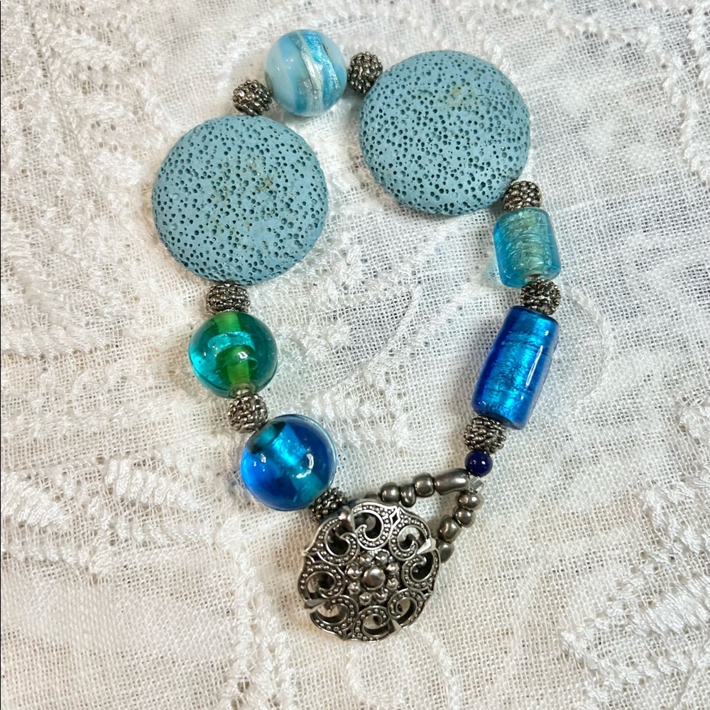 Boho bracelet in beachy blue colors. Lava, glass, acrylic.
